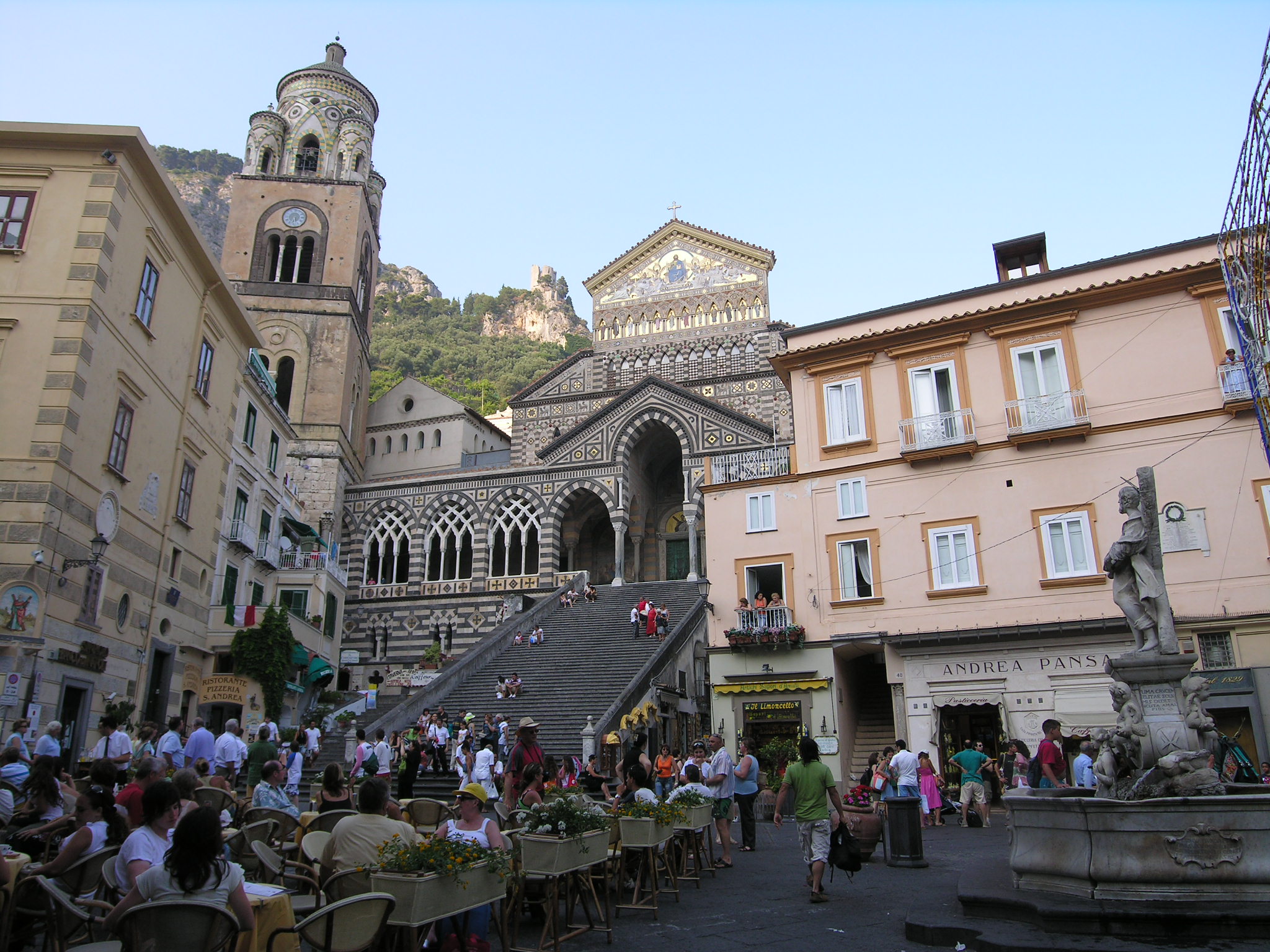 Amalfi Cathedral and Piazza del Duomo with tourists and historic architecture