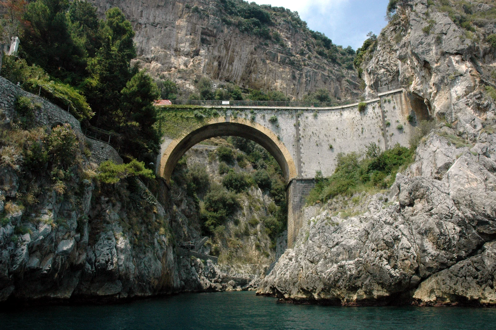 Fiordo di Furore bridge and cliffs seen from the sea along the Amalfi Coast