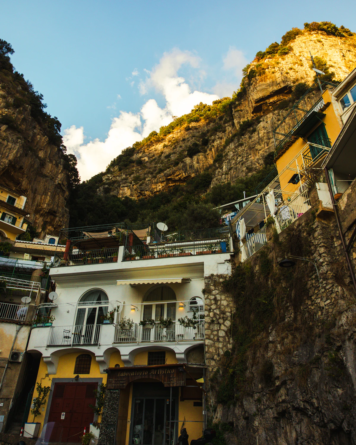 Steep stairway cutting between buildings in Positano